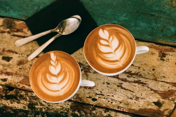 two cups of coffee with barista flourish. Yum!